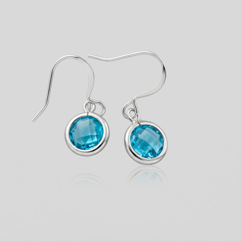 Pair of round faceted aqua glass drop earrings with curved silver-tone ear wires