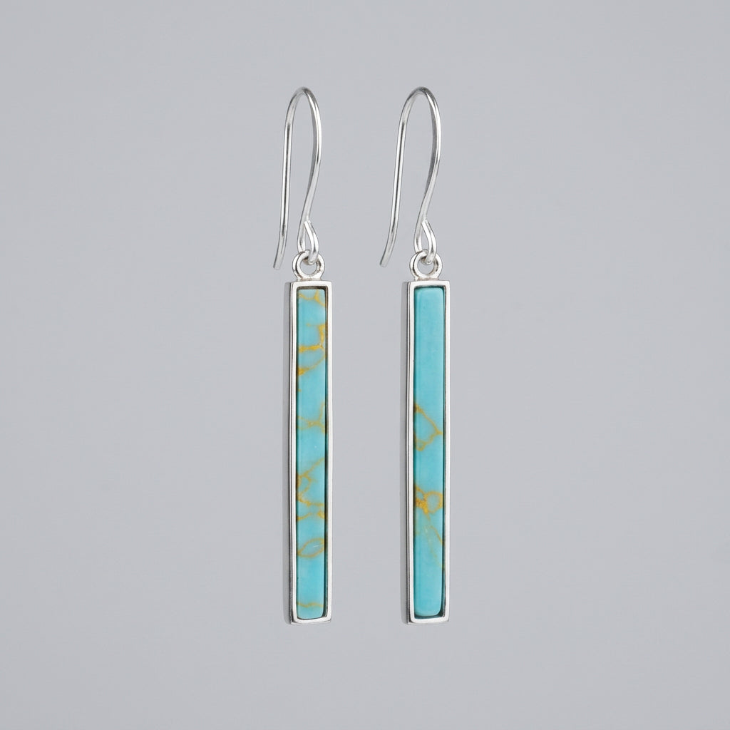 Turquoise rectangular bar drop earrings with silver-tone frames and curved silver-plated brass ear wires